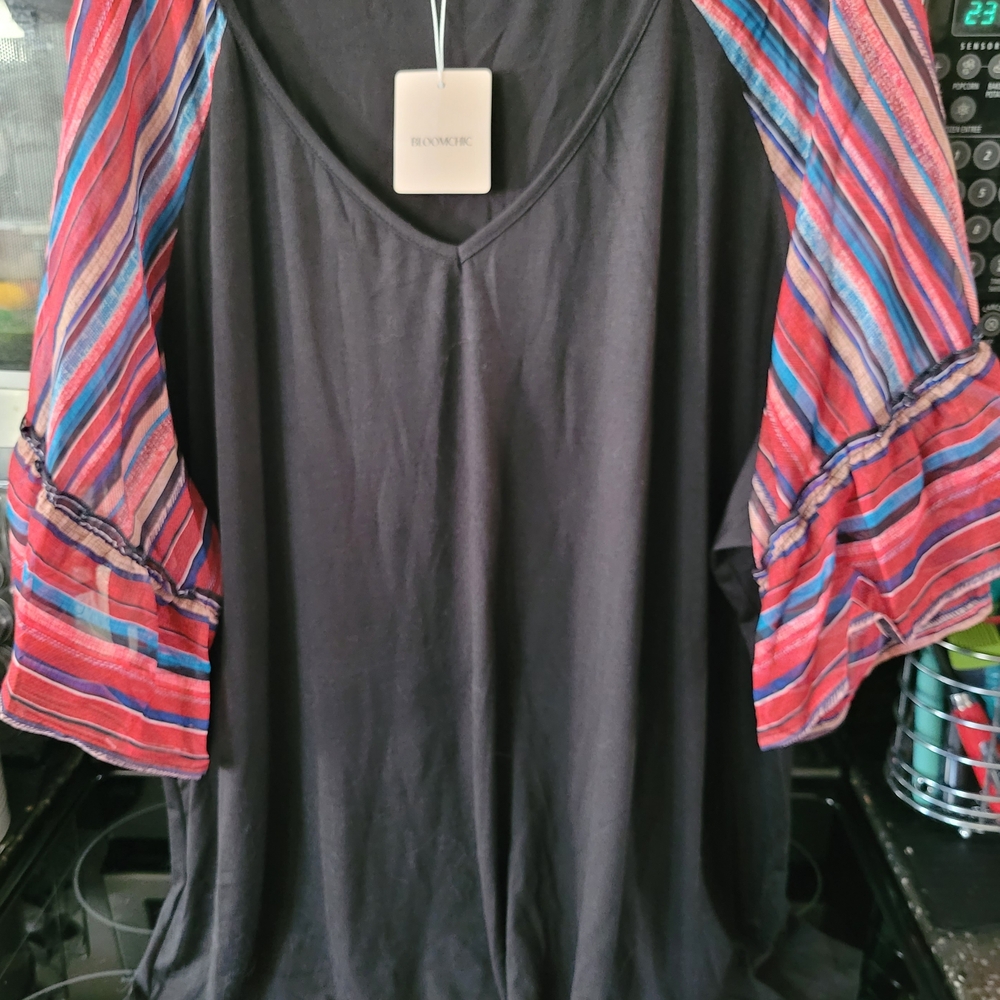 BloomChic Black Top with Vibrant Striped Sleeves